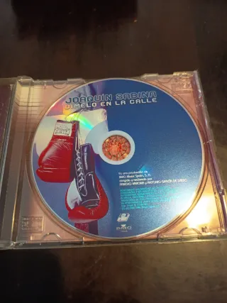 CD Joaquín Sabina - Dímelo en la Calle