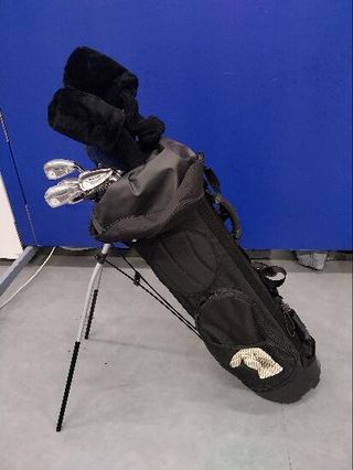 bolsa con palos de golf