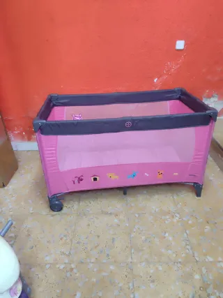 Cuna de viaje rosa
