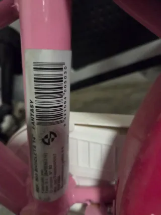 Bicicleta infantil rosa con asiento