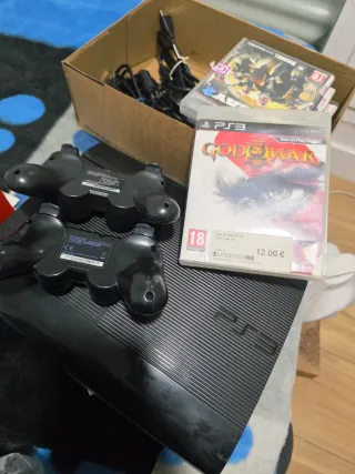 PlayStation 3 Slim 500GB + 2 Controles + 8 Juegos