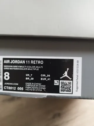 Jordan 11 Gris y Blanco