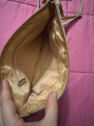 Pochette Segue beige con borchie