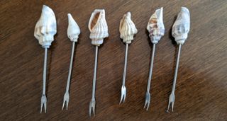 Set marinero de tenedores con conchas