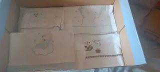 Ropa de cuna con diseño infantil