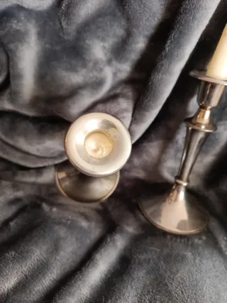 Candelabros de metal plateado y dorado