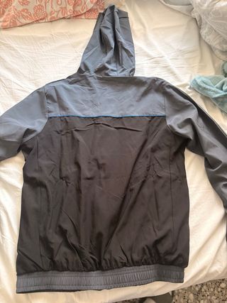 Cortavientos Syna World Negro/Azul/Gris