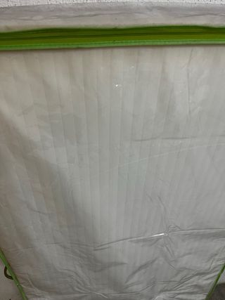 Colchón con funda protectora