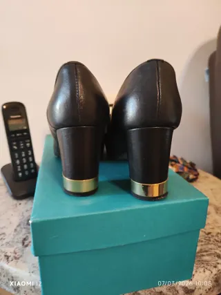 Mocassini tacco Mani nero oro