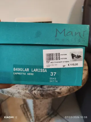 Mocassini tacco Mani nero oro