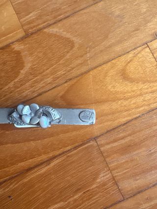 Fermacarte in metallo decorato