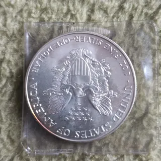 Lote 2 Monedas Plata Canadá y EEUU brillo original