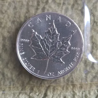 Lote 2 Monedas Plata Canadá y EEUU brillo original