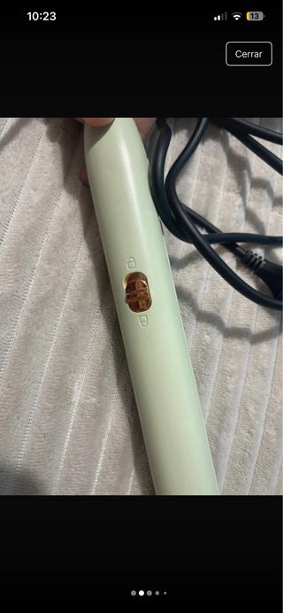 Plancha de pelo verde y dorada