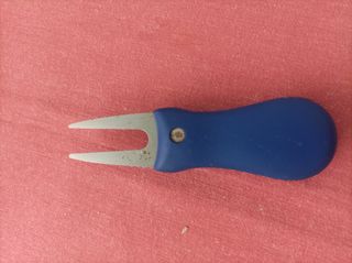 Herramienta de reparación de divots de golf