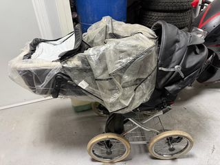 Carro de bebé con capazo y plástico