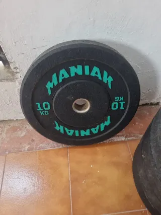 Set discos y barra olímpica