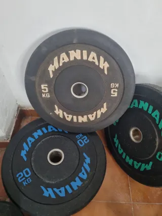 Set discos y barra olímpica