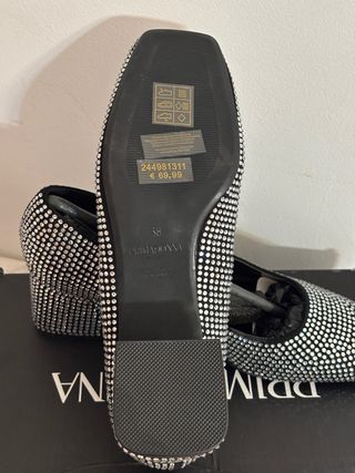 Zapatos de fiesta plateados y negros