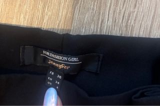 Pantalón negro ancho con cinturón