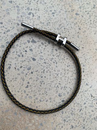 Pulsera Hermes Negra y Dorada