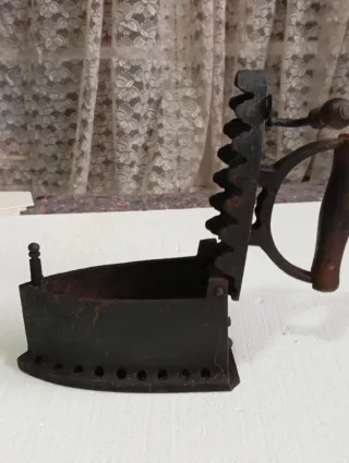 Plancha antigua de hierro