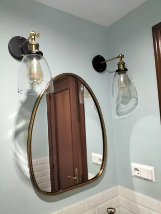 Apliques de pared dorados y negros