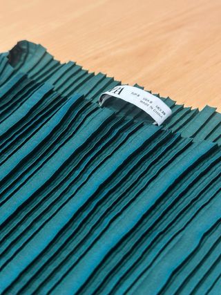 Conjunto verde: top sin mangas y pantalón