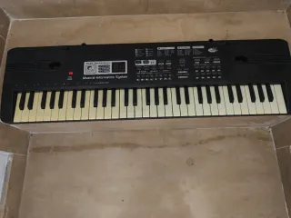 Teclado Musical con Pantalla Digital