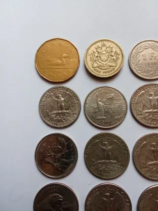 Lotto di 12 monete: Canada, UK, Svizzera, USA