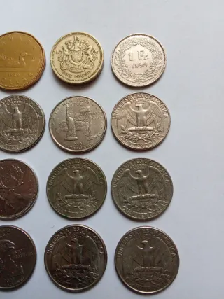 Lotto di 12 monete: Canada, UK, Svizzera, USA