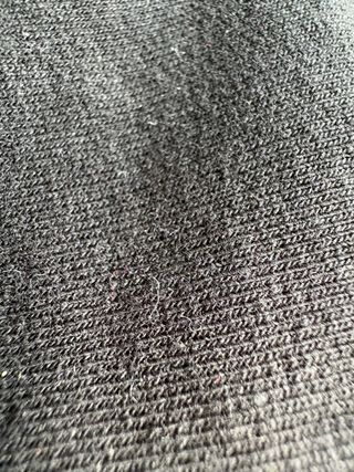 Jersey negro con manga de brillo