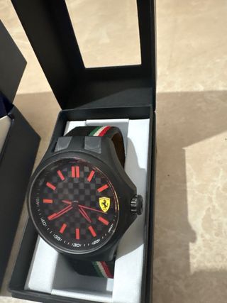 Orologio Maserati nuovo + orologio Ferrari usato