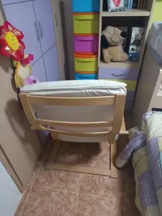 Poltrona a dondolo in legno e tessuto sfoderabile