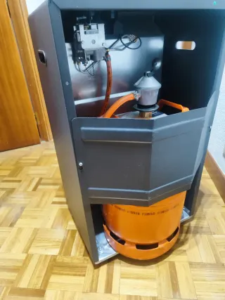 Estufa de gas negra llama azul