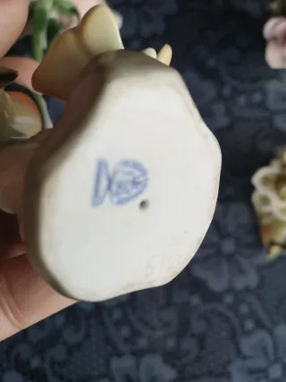 Figura pájaro y flores de porcelana