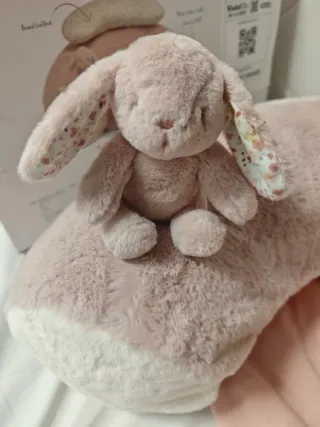 Cojín de lactancia y bebé rosa