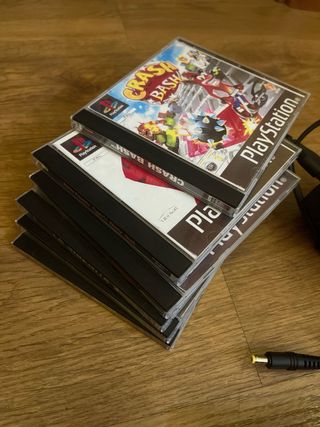 Playstation 2 Negra con juegos y micrófonos