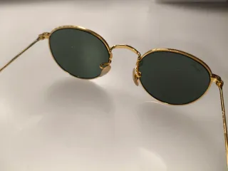 Gafas de sol Ray-Ban doradas y verdes