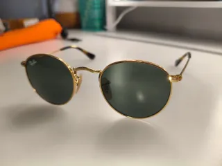 Gafas de sol Ray-Ban doradas y verdes