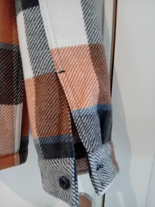 Cazadora Quiksilver cuadros forro sherpa. T. M