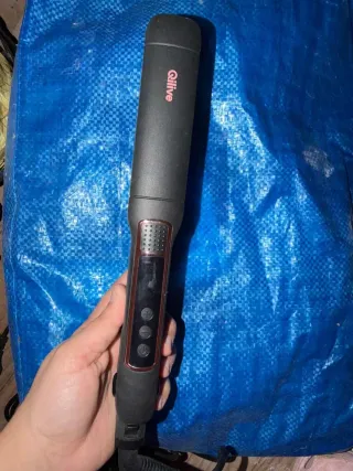 Plancha de pelo Qlive negra y rosa