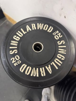 Black training disc Discos de peso Singular WOD