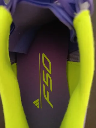 Botas de fútbol Adidas F50 verdes y moradas