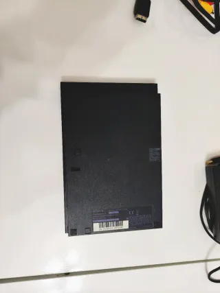 PlayStation 2 Nera Completa di Accessori