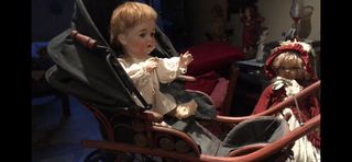 Carrito de muñeca antiguo