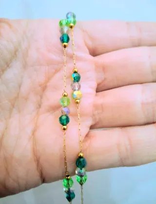 Collana matinee con perle verdi e oro