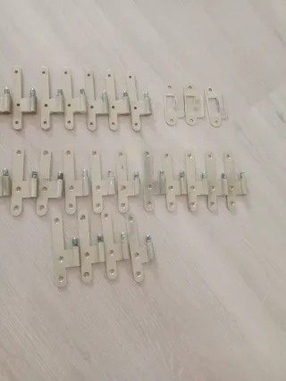 Pernios y complementos para puertas