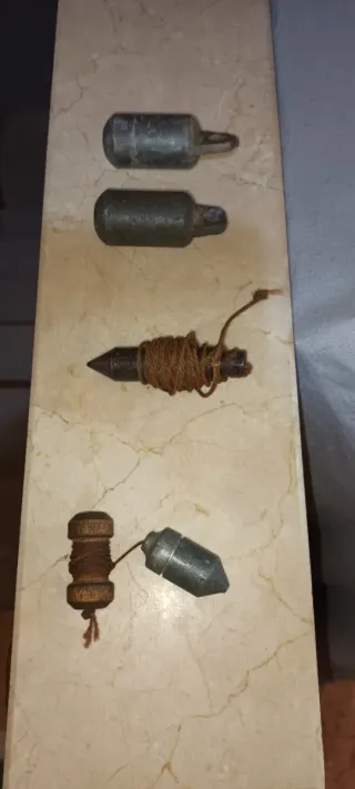 Herramientas de plomada antiguas