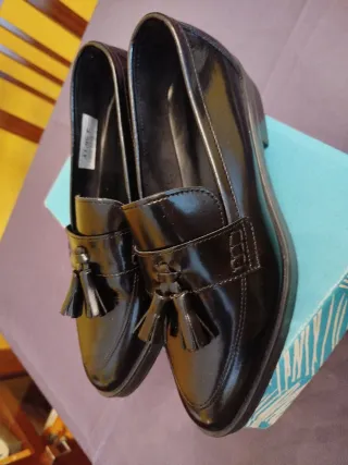 Mocasines negros con flecos talla 39